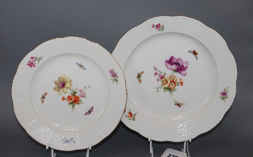 A set of eight Berlin plates, decorated with butterflies and flowers, diameter 21cm (5) and 24cm (3)